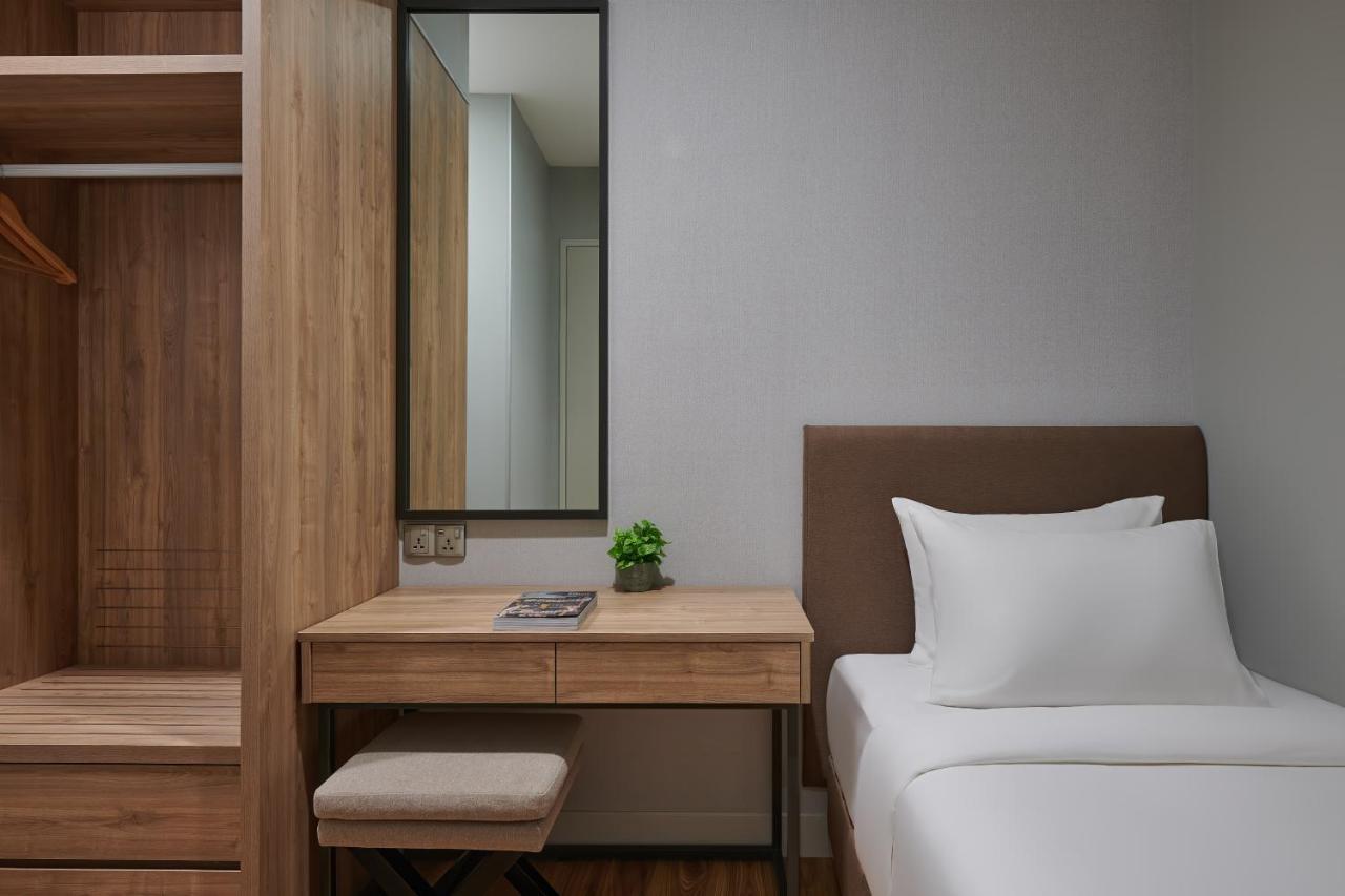 Mercure Living 푸트라자야 외부 사진 A bedroom at the hotel